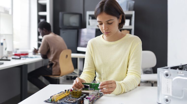 close-up-woman-repairing-computer-chips